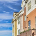 Square Townhouses with balconies that looks out to scenic views of the neighborhood