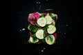 Square vegan sandwich with cucumber, radish, parsley and dill, d