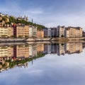 Square view Lyon city with reflection in Soane