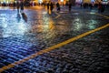 Square, with wet paving stones and walking people, spring city landscape, Moscow Royalty Free Stock Photo