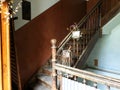 Square wooden staircase in an old building in Lviv Royalty Free Stock Photo