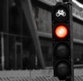 Squared closeup of a bike traffic light showing red light stop sign Royalty Free Stock Photo