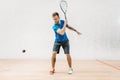 Squash game training, male player with racket Royalty Free Stock Photo