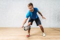 Squash game training, male player with racket Royalty Free Stock Photo