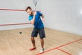 Squash game training, male player with racket Royalty Free Stock Photo