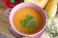 Squash soup and organic pumpkin fresh vegetables: corn, red pepp