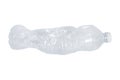 Squashed plastic bottle for use recycle isolated on white background Royalty Free Stock Photo
