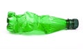 Squashed plastic green bottle Royalty Free Stock Photo