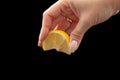 Squeeze lemon juice on hand for Royalty Free Stock Photo