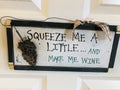 squeeze me a little and make me wine (whine) Wooden sign Royalty Free Stock Photo