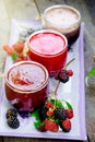 Squeezed, blended fresh organic forest berries, healthy refreshing drink