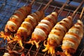 Squid grilled on stanless stelel container. Royalty Free Stock Photo