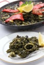 Squid ink paella Royalty Free Stock Photo