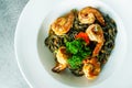 Squid Ink Pasta with Shrimp, Stir-Fried  Black Spaghetti Royalty Free Stock Photo