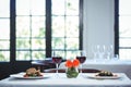 Squid ink spaghetti dish with basil for two with glasses of red wine Royalty Free Stock Photo