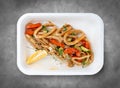 Squid pasta. Healthy food. Takeaway food. Top view, on a gray background