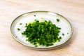 Squid salad with egg, green onion Step-by-step recipe step 4 cutting ingredient Royalty Free Stock Photo