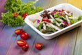 Squid salad with fresh vegetables and herbs. Diet and healthy food  in eco containers. Takeaway Royalty Free Stock Photo