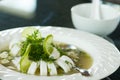 Squid steamed with lemon soup in white dish Royalty Free Stock Photo