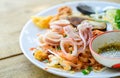 Squid on stir-fried rice noodles Pad Thai with mussels Royalty Free Stock Photo