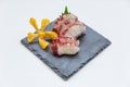 Squid Tentacle Sashimi served with Sliced Radish Royalty Free Stock Photo