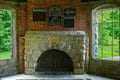 Squires Castle Fireplace with historical plaques