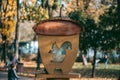 Squirrel feeder in the form of a tree nut in a park