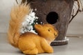 Squirrel Figurines And Snowy Birdhouse