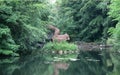 Squirrel Sculpture with Pond