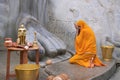 SRAVANABELGOLA, KARNATAKA, MAY 2016, Priest offers worship to gigantic statue of Bahubali, Chandragiri hill