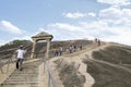 SRAVANABELGOLA, KARNATAKA, MAY 2016, Tourist, devotees climbing and rock cut steps leading to the Gomateshwara temple, Vindhyagiri