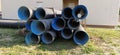 Sremska Mitrovica, Serbia, 23 August 2020. Metal corrugated pipes, blue inside. Plumbing or heating pipes lie on the ground next