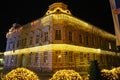 Sremska Mitrovica Serbia 12.07.23 Christmas New Year glowing golden garland is hung on the facade of the police building