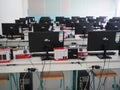 Sremska Mitrovica, Serbia, May 15, 2021 Group of computer neatly placed in a computer lab. Computers, monitors, wires in