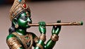 Sri Krishna plays the flute. Bronze Indian religious figurine