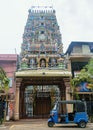 Tuk Tuk parked outside a Colorful Hindu temple