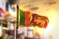 Sri Lanka Flag Against City Blurred Background At Sunrise Backlight