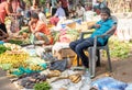Sri Lanka island, Weligama, February 2020. Editorial image. A teenager sells vegetables at the local market