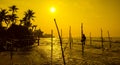 Sri Lanka`s traditional Fisherman on sanset. Fishing on silt is Royalty Free Stock Photo