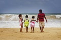 Sri Lanka: Sri Lankan family by the beach