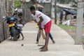 Sri Lankan boys playing cricket in Negombo.