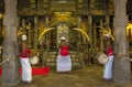 Sri Lankan drummers playing within the Temple of the Sacred Tooth Relic in Kandy, Sri Lanka.