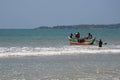 Sri Lankan fishermen on a boat return from fishing