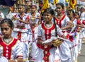 Sri Lankan girls perform during the Hikkaduwa perahera in Sri Lanka.