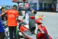 A Sri Lankan motorcyclist obtains his weekly quota of petrol at a fuel station in Colombo, Sri Lanka