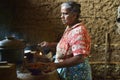 Polonnaruwa, Sri Lanka, November 8, 2015: Sri Lankian old woman preparing food in kitchen in traditional way