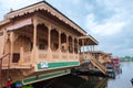 Srinagar, India - April 25, 2017 : Lifestyle in Dal lake, People living in 'House boat ' and using small boat 'Shikara ' for