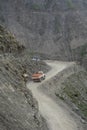 A car stopping on dangerous mountain road