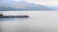 Srinagarind Dam Landscape Panorama with solar power generation panels and flotation devices, floating on reservoir water, Royalty Free Stock Photo