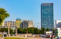 Srodmiescie downtown business district of Warsaw, Poland with Central Point Tower and historic residences at Swietokrzyska street